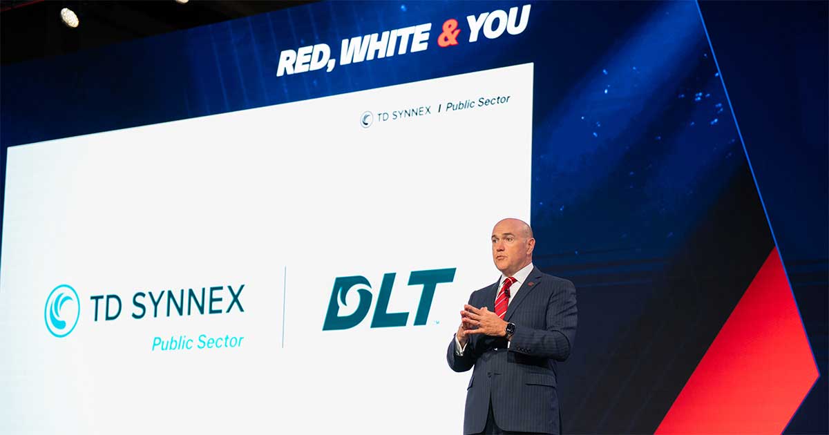 TD SYNNEX Public Sector/DLT's Eddie Franklin standing on stage at Red, White & You