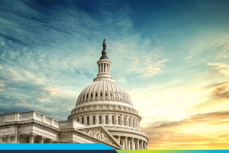 U.S. Capitol highlighted against a sunny sky