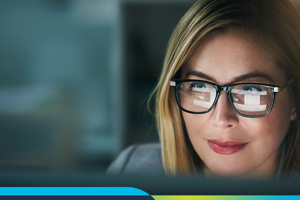 Woman staring at laptop