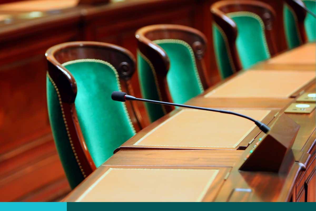 Empty chairs in a committee room